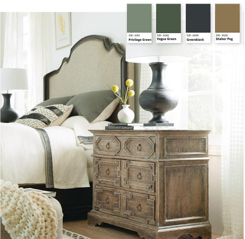 warm and relaxing bedroom with muted green bedding and accents. 